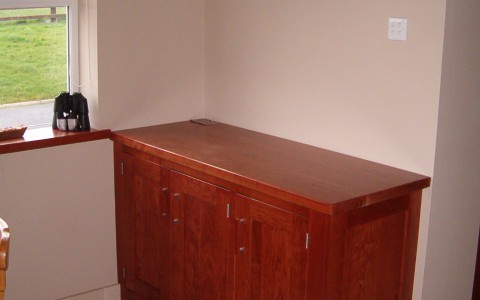 Cherry sideboard with floating shelves